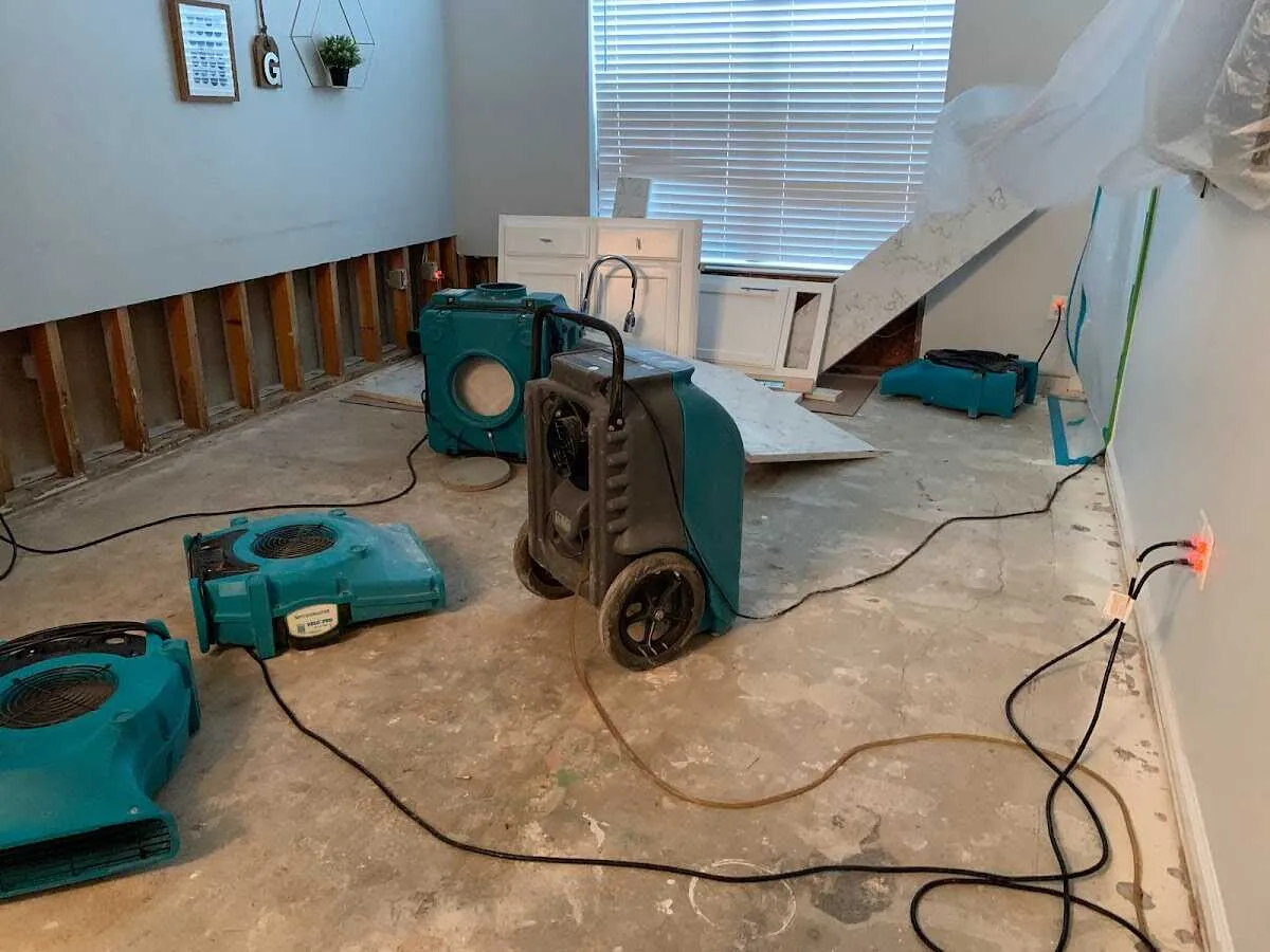 Dehumidifier in flood-cut room for Water Damage Restoration in Appleton